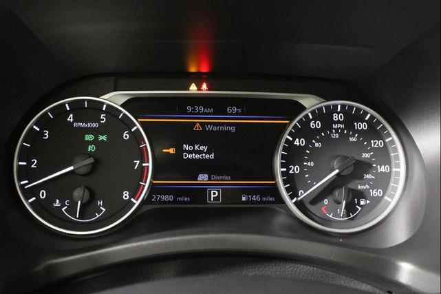 Photo of 2023 Aspen White Tricoat/Super Black Nissan Sentra