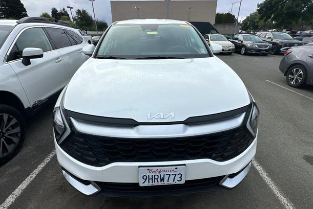 Photo of 2023 Snow White Pearl Kia Sportage Hybrid