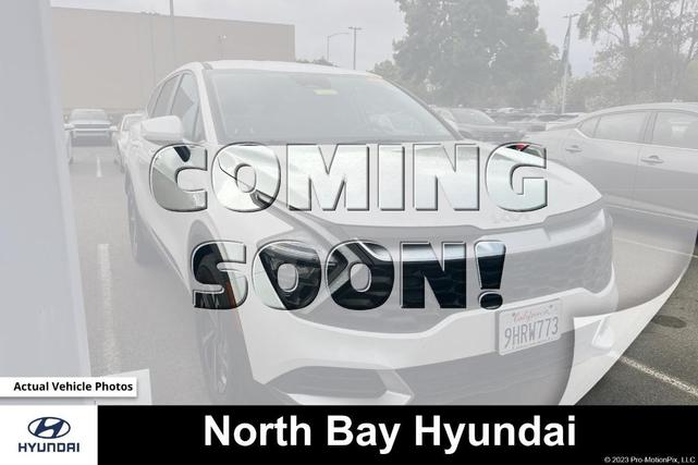 Photo of 2023 Snow White Pearl Kia Sportage Hybrid