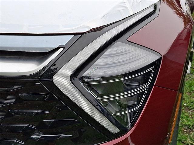 Photo of 2025 Dawning Red Kia Sportage Hybrid