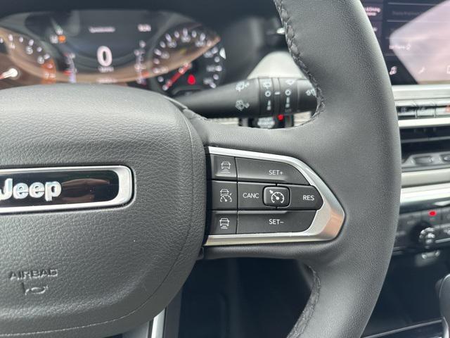 Photo of 2023 Granite Crystal Metallic Clearcoat Jeep Compass