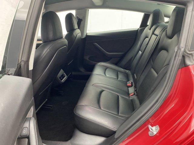 Photo of 2022 Red Tesla Model 3