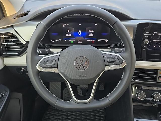 Photo of 2025 Pure White Volkswagen Taos