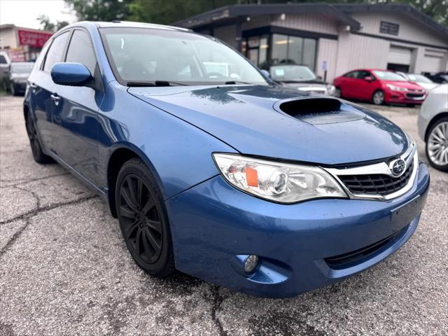 Photo of 2009 Newport Blue Pearl Subaru Impreza