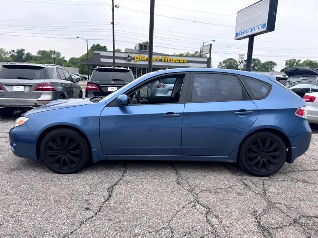 Photo of 2009 Newport Blue Pearl Subaru Impreza