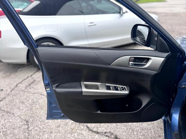 Photo of 2009 Newport Blue Pearl Subaru Impreza