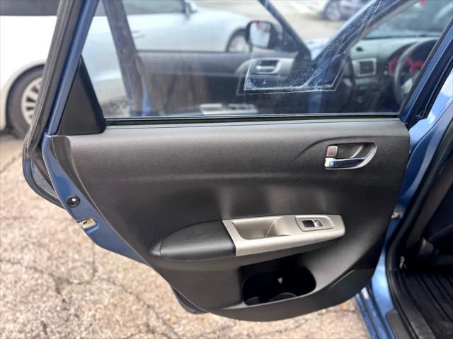 Photo of 2009 Newport Blue Pearl Subaru Impreza