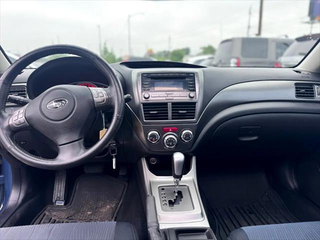 Photo of 2009 Newport Blue Pearl Subaru Impreza