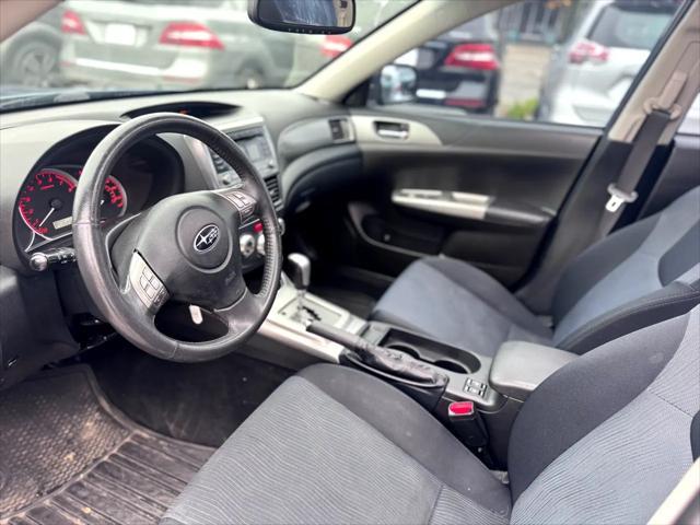 Photo of 2009 Newport Blue Pearl Subaru Impreza