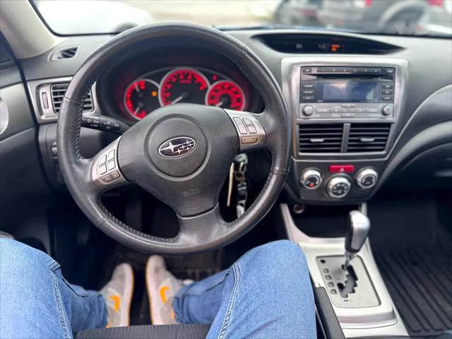 Photo of 2009 Newport Blue Pearl Subaru Impreza