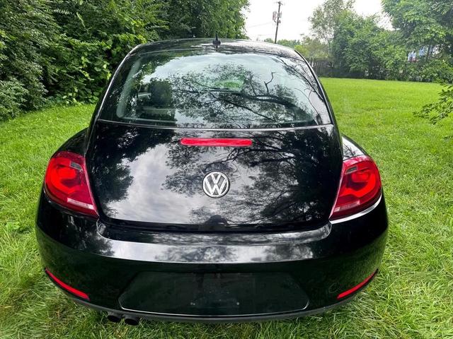Photo of 2015 Black Uni Volkswagen Beetle