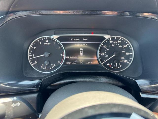 Photo of 2023 Obsidian Green Pearl/Super Black Nissan Pathfinder