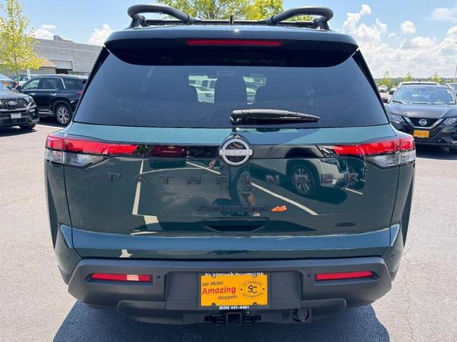 Photo of 2023 Obsidian Green Pearl/Super Black Nissan Pathfinder