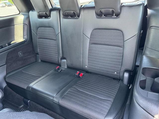 Photo of 2023 Obsidian Green Pearl/Super Black Nissan Pathfinder
