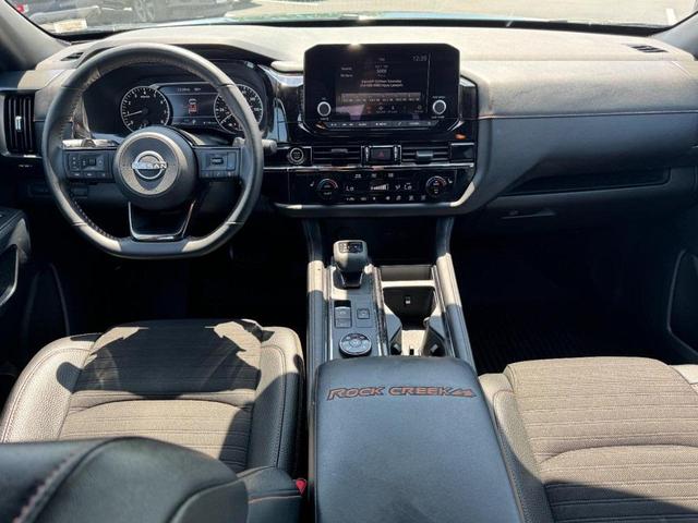 Photo of 2023 Obsidian Green Pearl/Super Black Nissan Pathfinder