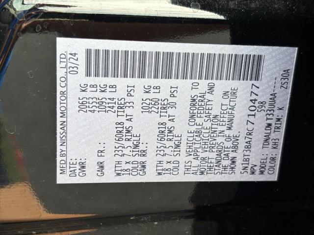 Photo of 2024 Super Black Nissan Rogue