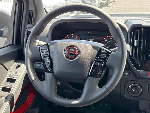 Photo of 2025 Super Black Nissan Frontier