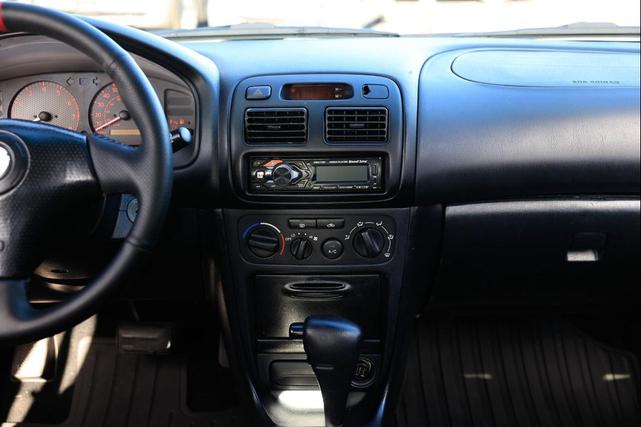 Photo of 2002 Black Sand Pearl Toyota Corolla