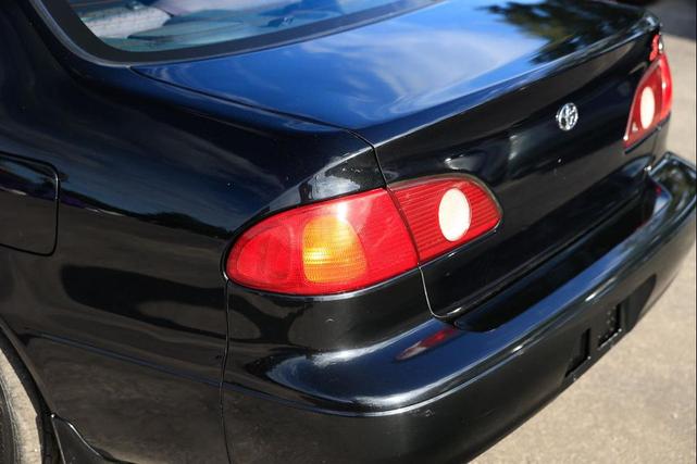 Photo of 2002 Black Sand Pearl Toyota Corolla