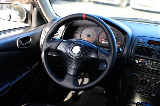 Photo of 2002 Black Sand Pearl Toyota Corolla