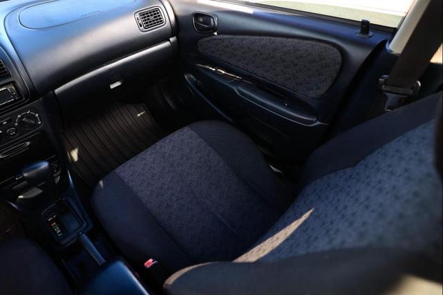 Photo of 2002 Black Sand Pearl Toyota Corolla