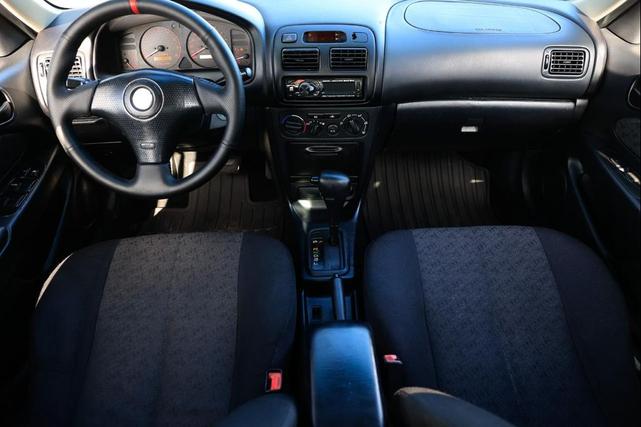 Photo of 2002 Black Sand Pearl Toyota Corolla