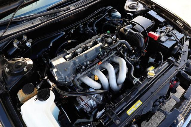 Photo of 2002 Black Sand Pearl Toyota Corolla