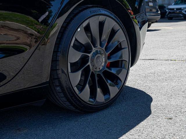 Photo of 2023 Solid Black Tesla Model 3