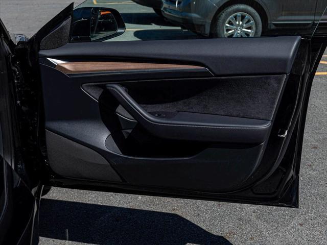 Photo of 2023 Solid Black Tesla Model 3