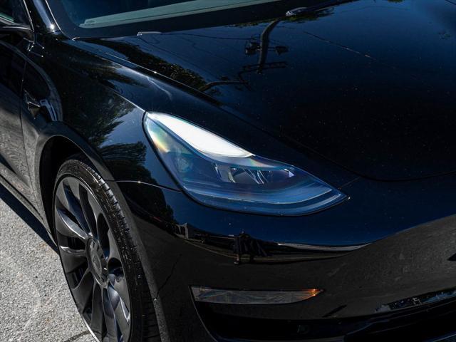 Photo of 2023 Solid Black Tesla Model 3