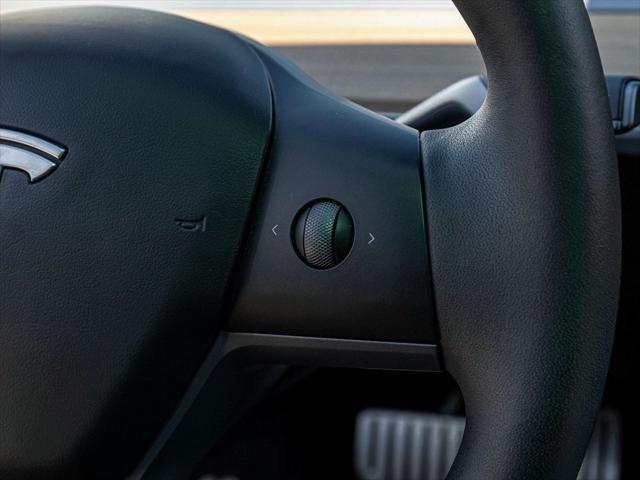 Photo of 2023 Solid Black Tesla Model 3