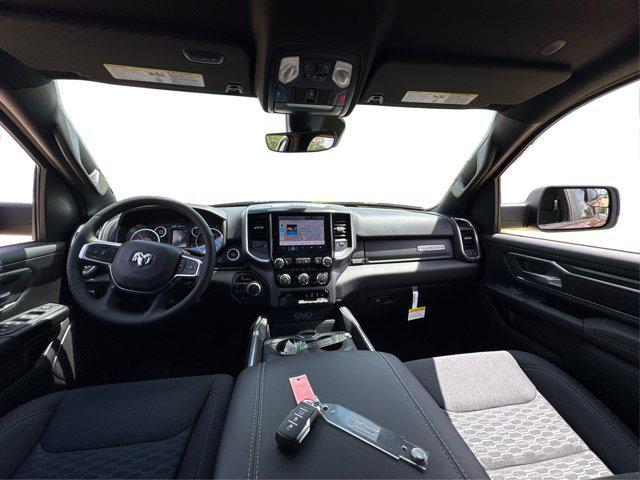 Photo of 2025 Delmonico Red Pearlcoat RAM 1500