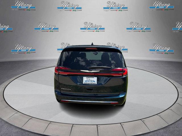 Photo of 2025 Fathom Blue Pearlcoat Chrysler Pacifica