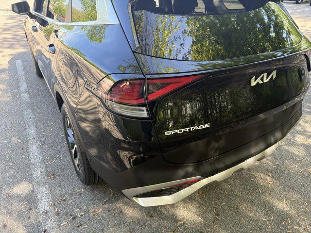 Photo of 2023 Fusion Black Kia Sportage Hybrid