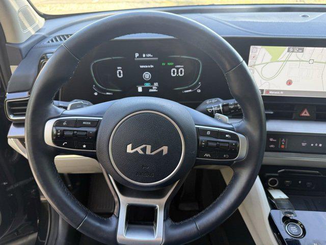 Photo of 2023 Fusion Black Kia Sportage Hybrid