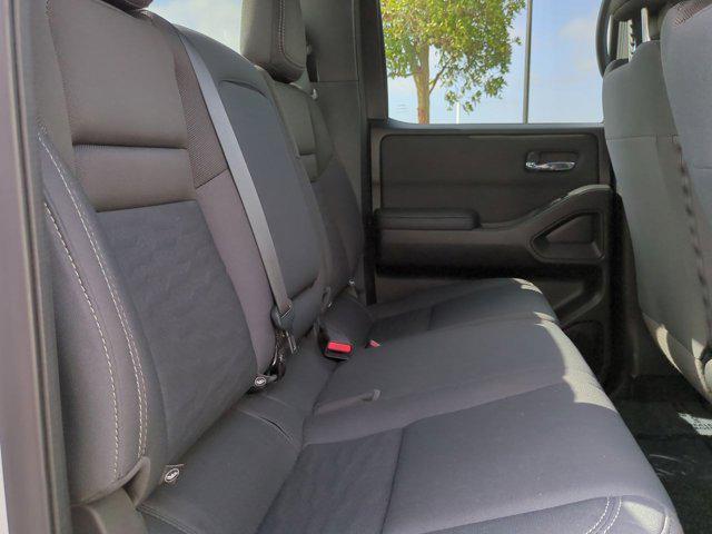 Photo of 2023 Glacier White Nissan Frontier