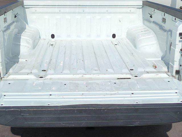 Photo of 2023 Glacier White Nissan Frontier