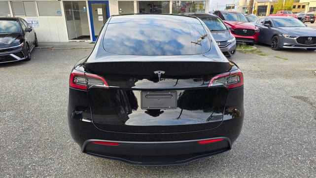 Photo of 2024 Solid Black Tesla Model Y