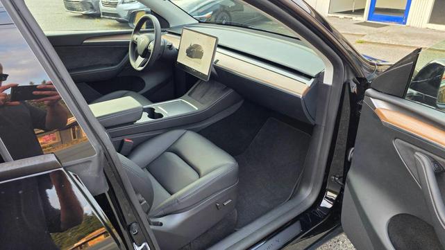 Photo of 2024 Solid Black Tesla Model Y