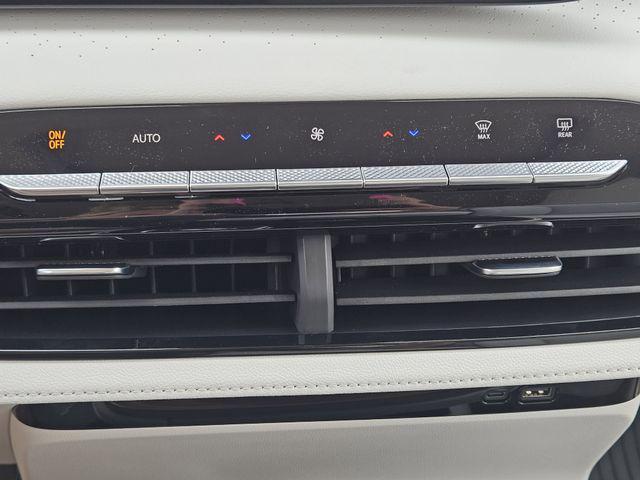 Photo of 2026 iridescent white tricoat Buick Enclave