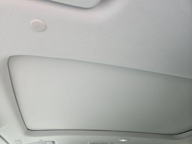 Photo of 2026 iridescent white tricoat Buick Enclave