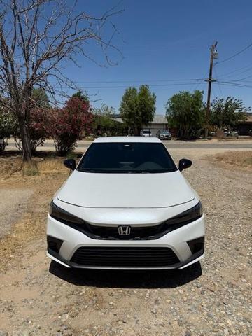 Photo of 2024 Platinum White Pearl Honda Civic