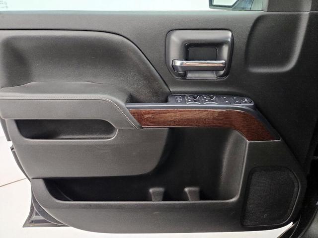 Photo of 2016 Black GMC Sierra 1500