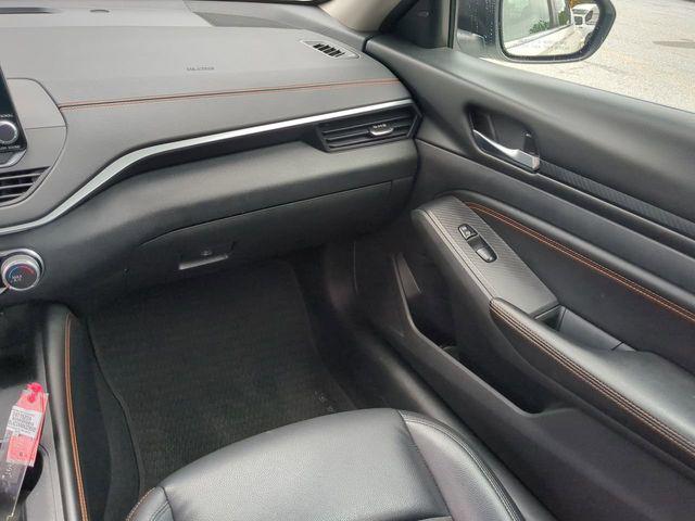 Photo of 2021 Pearl White Tricoat Nissan Altima