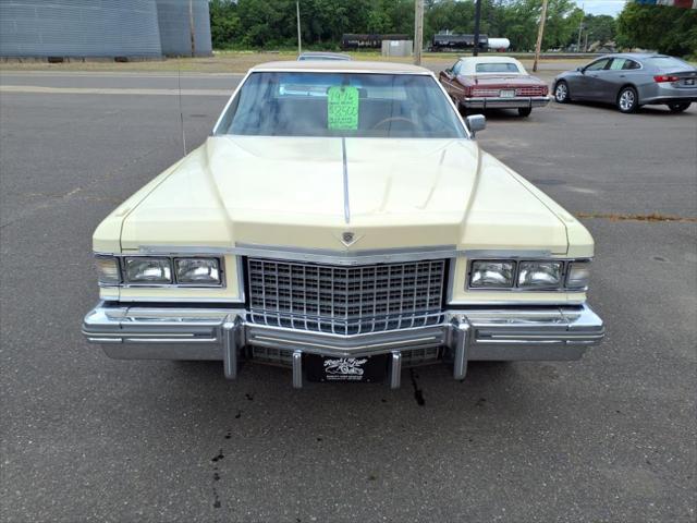 Photo of 1976 Yellow Cadillac DeVille