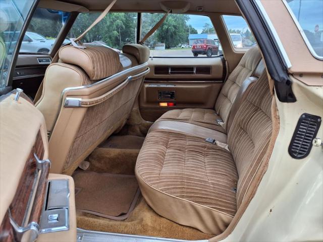 Photo of 1976 Yellow Cadillac DeVille