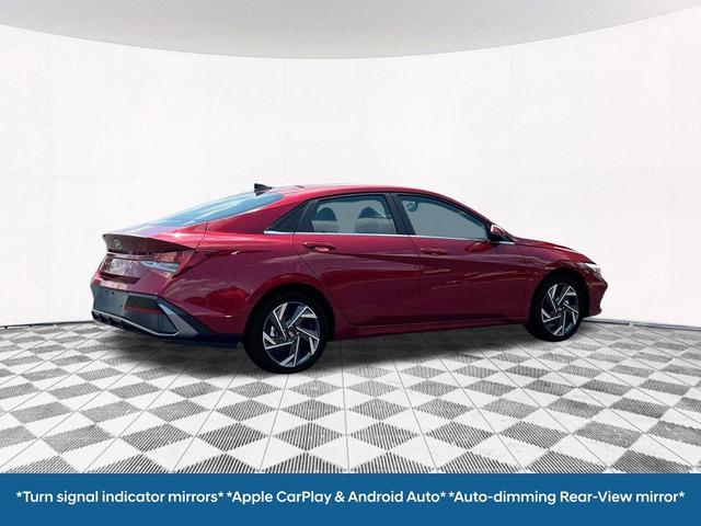 Photo of 2025 Red Metallic Hyundai ELANTRA HEV