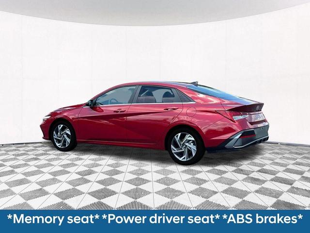Photo of 2025 Red Metallic Hyundai ELANTRA HEV