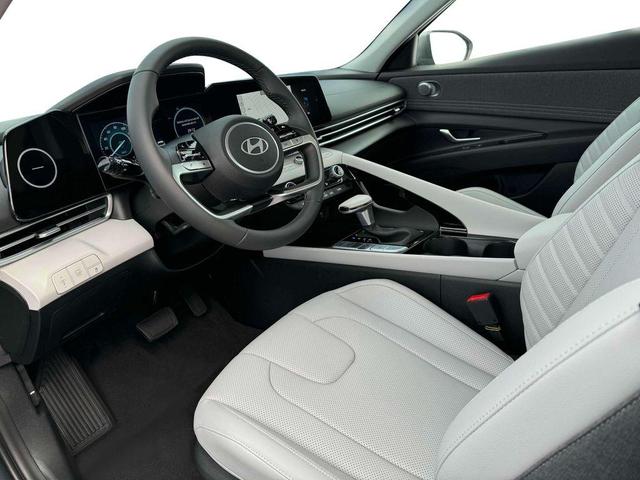 Photo of 2025 Red Metallic Hyundai ELANTRA HEV