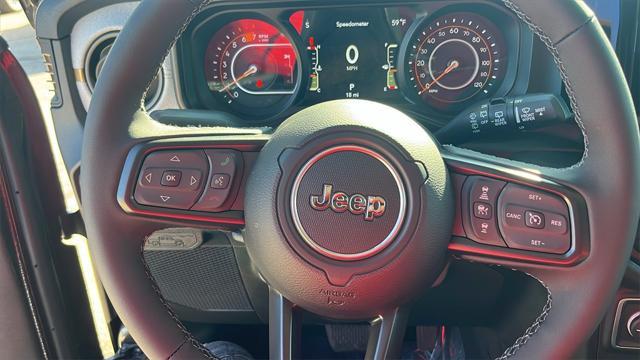 Photo of 2025 Granite Crystal Metallic Clearcoat Jeep Wrangler